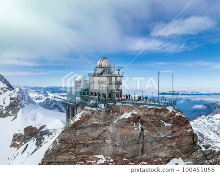 Aerial panorama view of the Sphinx Observatory on Jungfraujoch - Top of Europe, one of the highest observatories in the world located at the Jungfrau railway station, Bernese Oberland, Switzerland. Aerial panorama view of the Sphinx Observatory on Jungfraujoch - Top of Europe, one of the highest observatories in the world located at the Jungfrau railway station, Bernese Oberland, Switzerland. 100451056