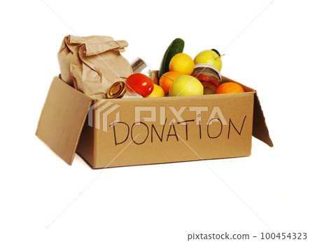 Various food in a cardboard donation box, isolated Various food in a cardboard donation box, isolated 100454323