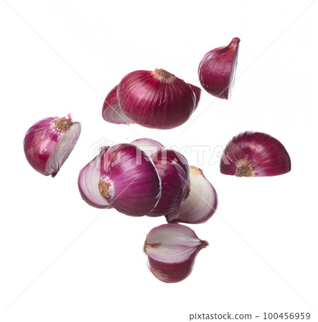 Shallots fall fly in mid air, red fresh vegetable spice shallots onion floating. Organic fresh herbal shallots root head cut chop slice. White background isolated freeze motion high speed shutter 100456959