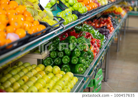 vegetables and fruits lie on the supermarket shelves vegetables and fruits lie on the supermarket shelves 100457635