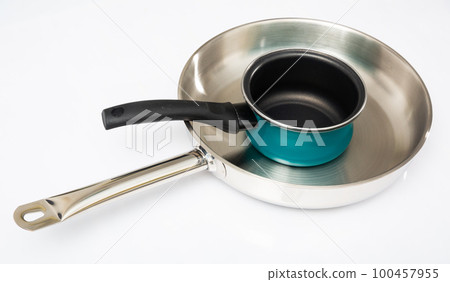 Stainless frying pan and blue non-stick saucepan on white Stainless frying pan and blue non-stick saucepan on white 100457955