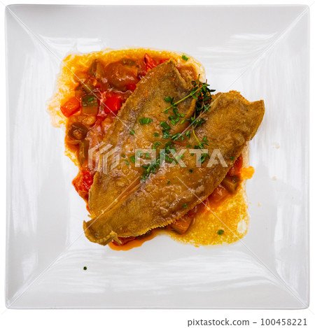 Fried sole fish with herbal oil and stewed vegetables Fried sole fish with herbal oil and stewed vegetables 100458221