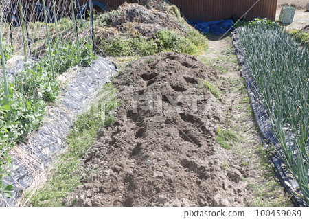 Soil preparation for summer vegetables After plowing Soil preparation for summer vegetables After plowing 100459089