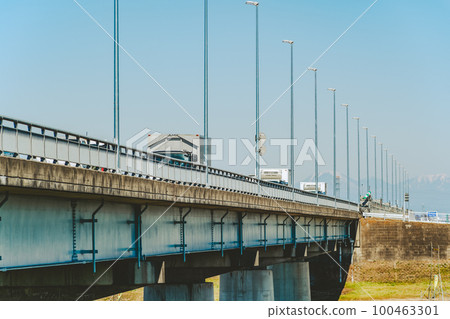 Bridge, logistics truck, early spring blue sky and Mt. Nantai in the distance Saitama prefectural road Kuginashi bridge b-4 film 100463301