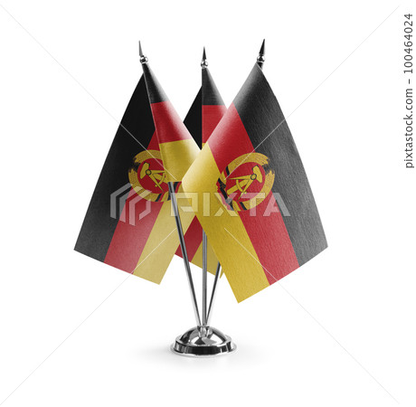 Small national flags of the DDR on a white background 100464024