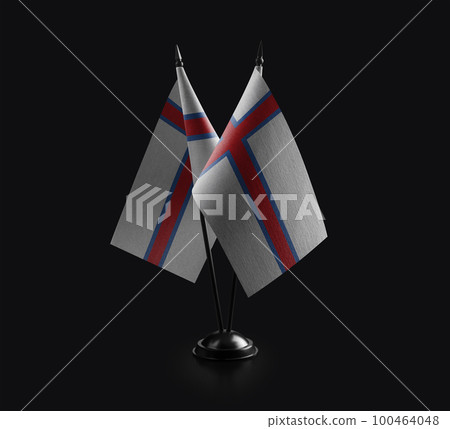 Small national flags of the Faroe Islands on a black background 100464048