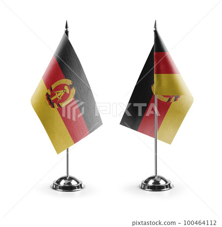 Small national flags of the DDR on a white background 100464112