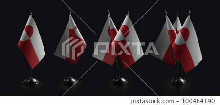 Small national flags of the Greenland on a black background 100464190