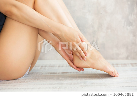 Women are doing skin care for their heels. Women are doing skin care for their heels. 100465891