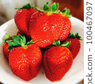 strawberries on a plate 100467097