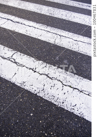 Old pedestrian crossing on the asphalt 100467831