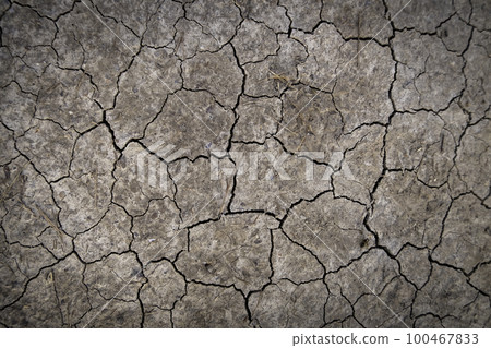 Dry soil due to drought Dry soil due to drought 100467833