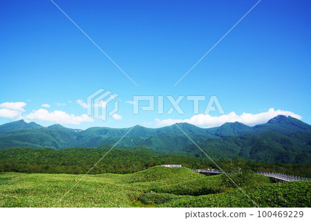 Shiretoko mountain range and wooden path in summer, Hokkaido Shiretoko mountain range and wooden path in summer, Hokkaido 100469229