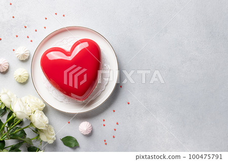 frame made of rose flowers, heart shape mousse cake and sweets frame made of rose flowers, heart shape mousse cake and sweets 100475791