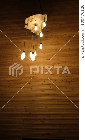 chandelier on a wooden board chandelier on a wooden board 100476126