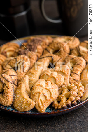 Assorted various cookies. Sweet biscuits on plate. Assorted various cookies. Sweet biscuits on plate. 100476256