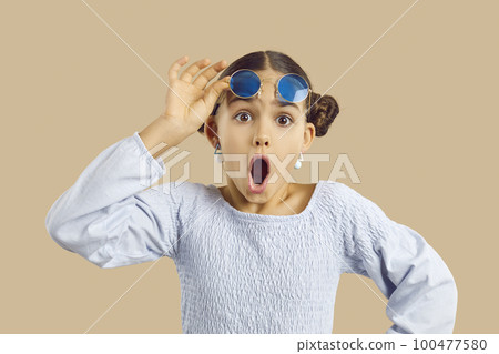 Funny amazed teen girl shocked by great deal 100477580