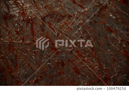 Cracked glass with blood drops or paint closeup Cracked glass with blood drops or paint closeup 100479258