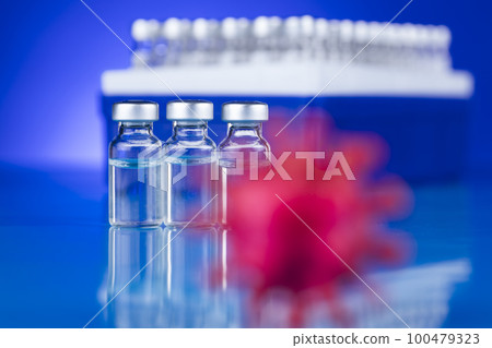 Ampoules with covid 19 vaccine 100479323