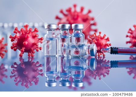 Close up medical syringe with a vaccine 100479486
