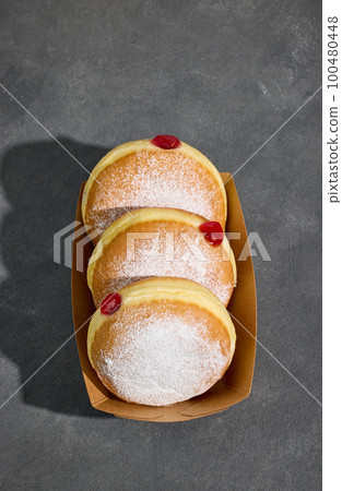 freshly baked jelly donuts freshly baked jelly donuts 100480448