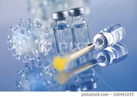 Close up medical syringe with a vaccine Close up medical syringe with a vaccine 100481035