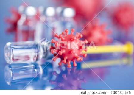 Close up medical syringe with a vaccine 100481156