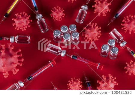Close up medical syringe with a vaccine 100481523