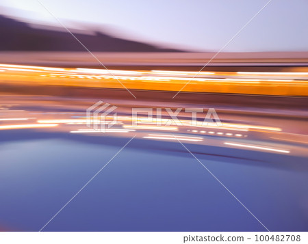 Abstract blurry view of urban street lights background Abstract blurry view of urban street lights background 100482708