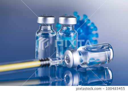 Close up medical syringe with a vaccine 100483455