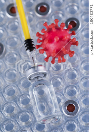 Close up medical syringe with a vaccine 100483771