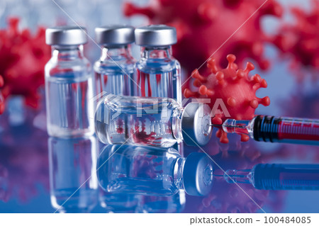 Close up medical syringe with a vaccine 100484085