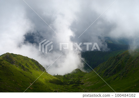 Clouds in the mountains 100484102