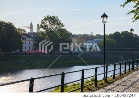waterfront of the river uzh with lanterns. urban scenery at sunrise waterfront of the river uzh with lanterns. urban scenery at sunrise 100487247