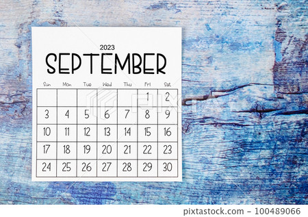 The September 2023 Monthly calendar for 2023 year on old blue wooden background. 100489066