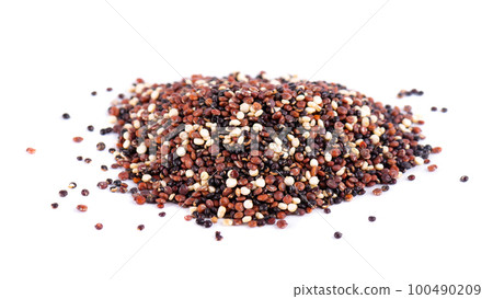 Quinoa seeds isolated on white background. Mix of white, red and black quinoa. Quinoa seeds isolated on white background. Mix of white, red and black quinoa. 100490209