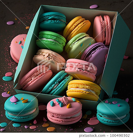Cakes macaron or macaroon in blue box on rustic table, colorful bright cookies. 100490302
