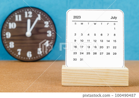 The July 2023 Monthly calendar for 2023 year on wooden table. 100490487