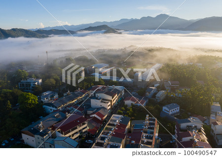 morning cloudy landscape with mist 100490547