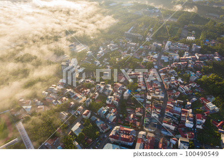 morning cloudy landscape with mist 100490549