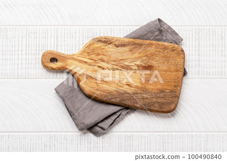 Wooden cutting board and kitchen towel Wooden cutting board and kitchen towel 100490840