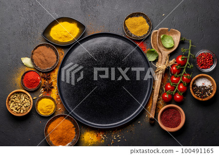 Empty plate and various spices Empty plate and various spices 100491165