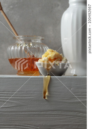 Fresh cottage cheese or ricotta with honey. Fresh cottage cheese or ricotta with honey. 100492667