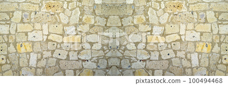 Sturdy yellow and beige cut stone wall, seamless lined up Sturdy yellow and beige cut stone wall, seamless lined up 100494468