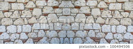 Sturdy white and beige cut stone wall, seamless lined up 100494506