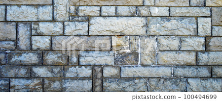 Sturdy blue and gray cut stone wall, seamless lined up Sturdy blue and gray cut stone wall, seamless lined up 100494699