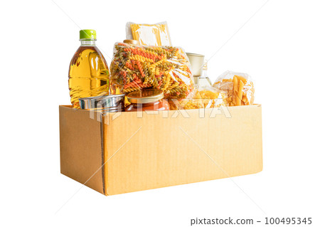 Foodstuff for donation isolated on white background with clipping path, storage and delivery. Various food, pasta, cooking oil and canned food in cardboard box. 100495345