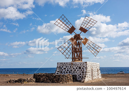 Windmill near the village of Puerto Lajas on Fuerteventura Island 100497614