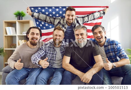 Happy American father and sons celebrating Independence Day or watching sports on TV Happy American father and sons celebrating Independence Day or watching sports on TV 100501513