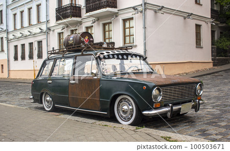 old rusty car on the street of Minsk 100503671